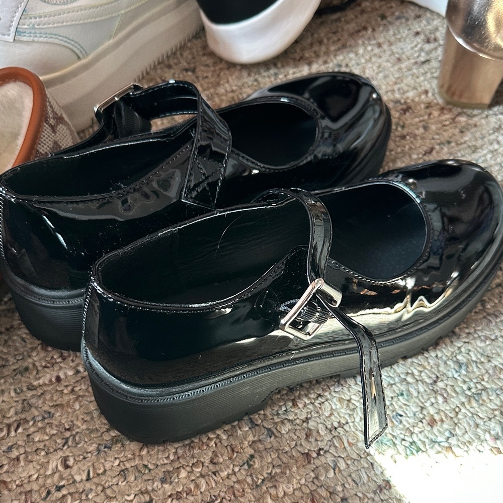 Sleek Black Patent Leather Mary Jane Flats